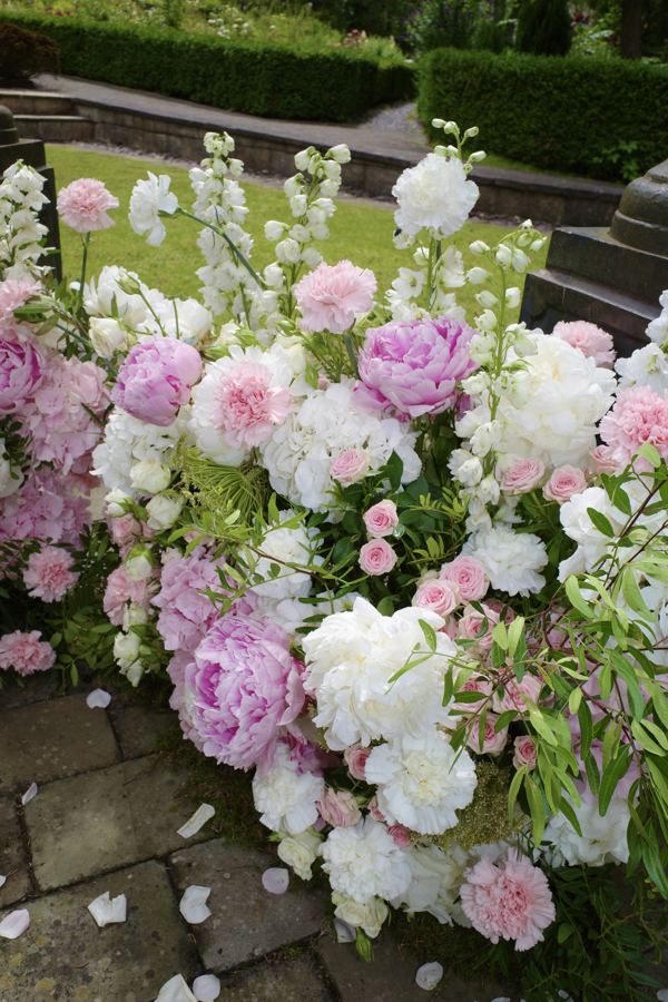 Garden ceremony florals in pink and white